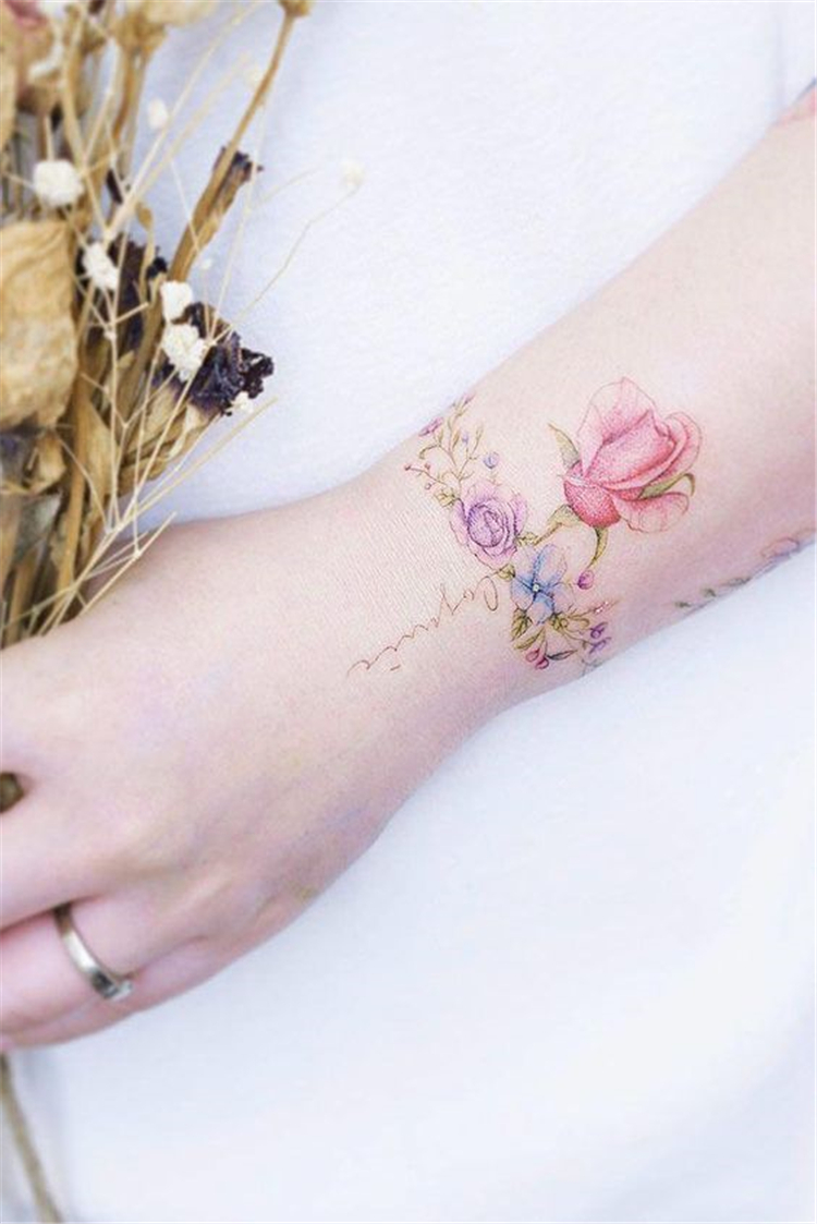 Meaningful Wrist Bracelet Floral Tattoo Designs You Would Love To Have; Floral Tattoo; Bracelet Floral Tattoo; Tattoo Designs; Tattoo Ideas; Flower Tattoo; Rose Tattoo; Small Floral Tattoo; #tattoo #tattooideas #floraltattoo #flowertattoo #rosetattoo #rose #chictattoo 